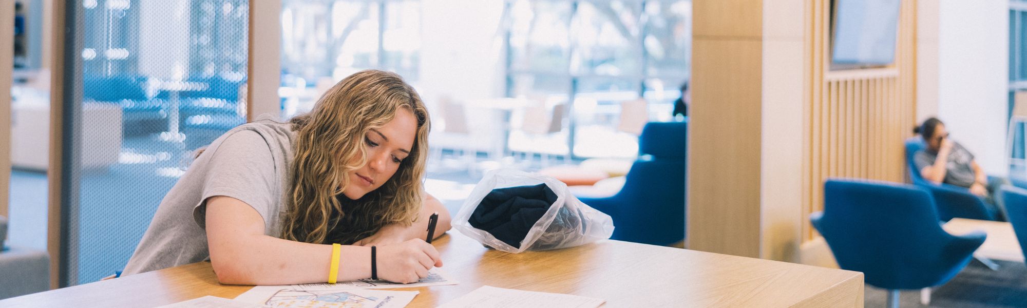 Student studying in the student union.